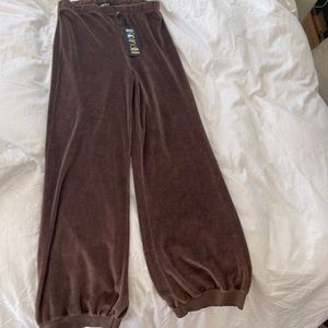 Brand new with tags. Suzie Kondi high waisted harem pants in XS. Fawn color.